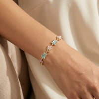 Pastel Enamel Sakura Blossom Floral Station Bracelet - View 2 | ANUSI 18K Gold Jewelry