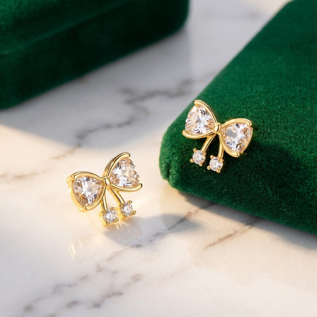 Dainty Pavé Ribbon Bow Stud Earrings | 18K Gold Plated | Anti-Tarnish Demi-Fine Sweat-Proof - ANUSI Demi-Fine Jewelry Shot 4