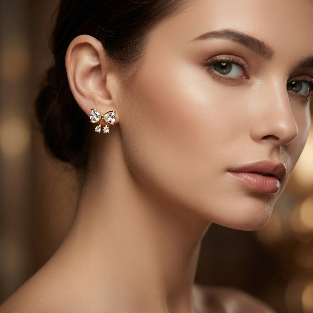 Dainty Pavé Ribbon Bow Stud Earrings | 18K Gold Plated | Anti-Tarnish Demi-Fine Sweat-Proof - ANUSI Demi-Fine Jewelry Shot 2