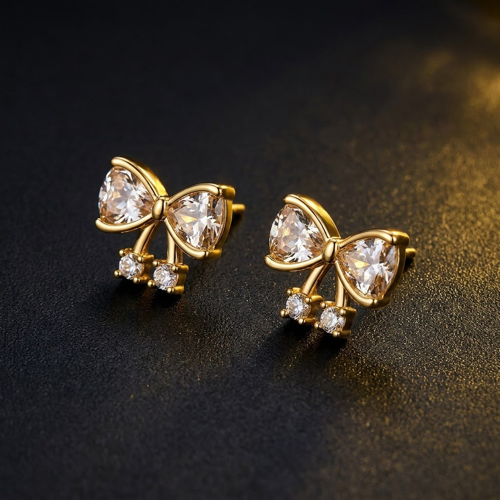 Dainty Pavé Ribbon Bow Stud Earrings | 18K Gold Plated | Anti-Tarnish Demi-Fine Sweat-Proof - ANUSI Demi-Fine Jewelry Shot 7
