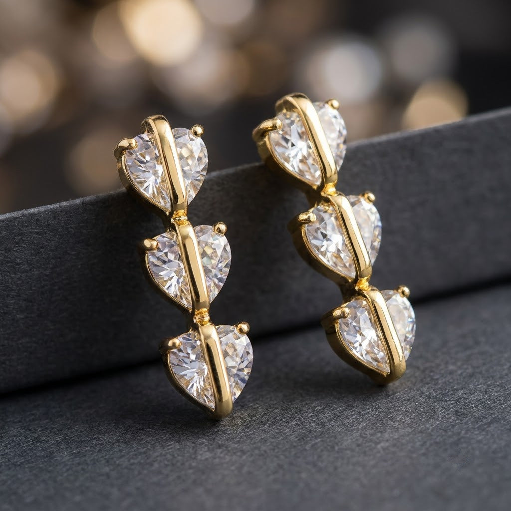 Cascading Triple Heart Linear Drop Earrings | 18K Gold Plated | Anti-Tarnish Demi-Fine Sweat-Proof - ANUSI Demi-Fine Jewelry Shot 3