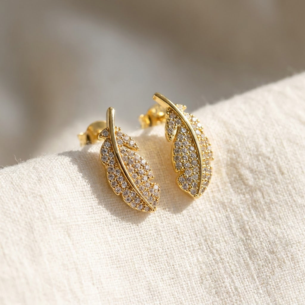 Gilded Feather Pavé Crystal Stud Earrings | 18K Gold Plated | Anti-Tarnish Demi-Fine Sweat-Proof - ANUSI Demi-Fine Jewelry Shot 5