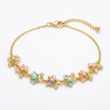 Pastel Blossom Floral & Butterfly Crystal Bracelet - View 1 | ANUSI 18K Gold Jewelry