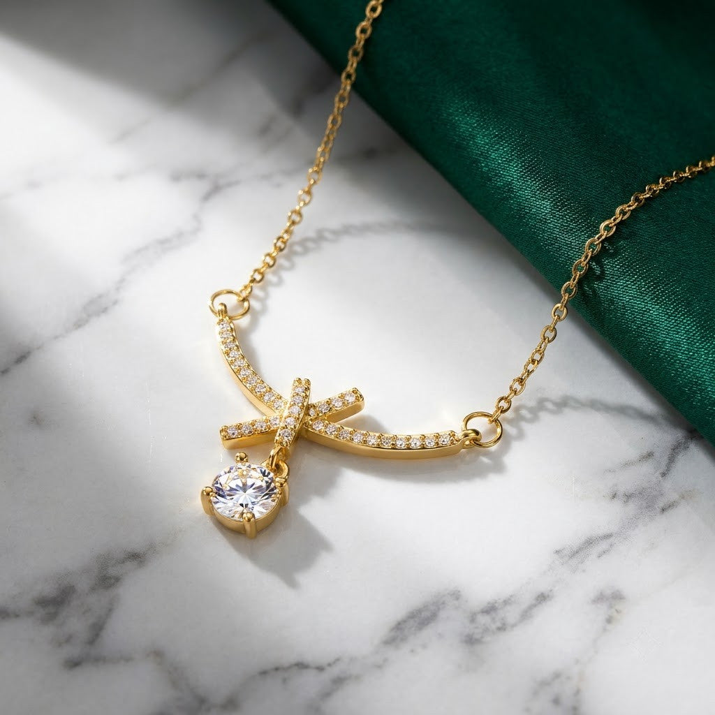 Petite Ribbon Bow & Princess-Cut Solitaire Drop Necklace - View 1 | ANUSI 18K Gold Jewelry