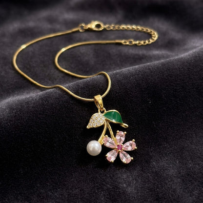 Sakura Blossom Botanical Branch & Emerald Leaf Necklace - View 2 | ANUSI 18K Gold Jewelry
