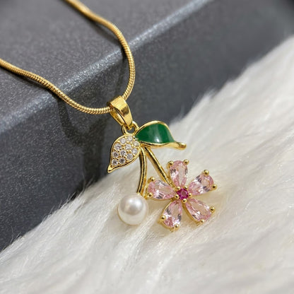 Sakura Blossom Botanical Branch & Emerald Leaf Necklace - View 4 | ANUSI 18K Gold Jewelry