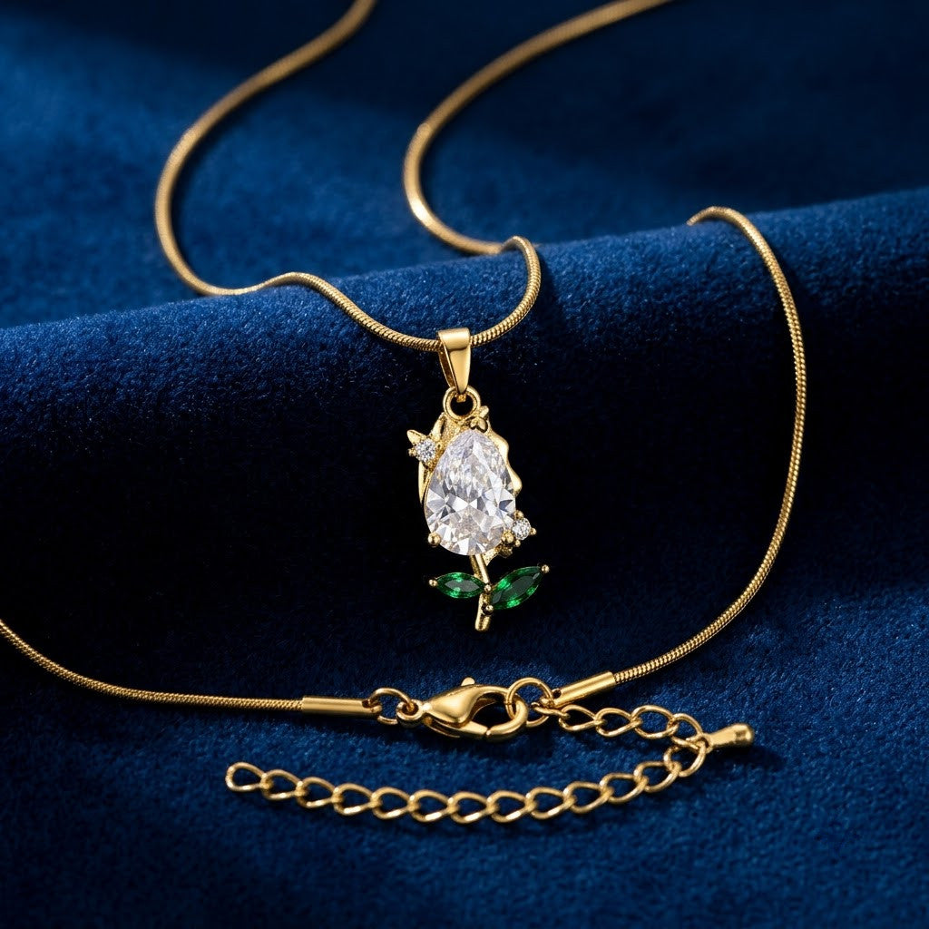 Solitaire Pear Crystal & Emerald Rosebud Necklace - View 1 | ANUSI 18K Gold Jewelry